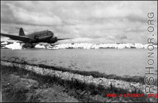 A C-46 on a runway in the CBI.  Interestingly, a censor has scratched out the mountains in the background.   From the collection of Robert H. Zolbe.