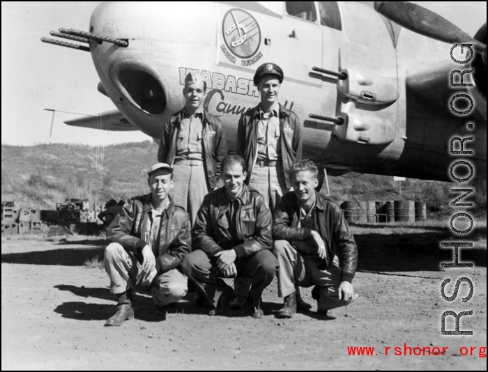 491st Bomb Squadron air crew at Yangkai, China, with the B-25H "Wabash Cannonball". In back are Lt. Jack H. Wilson (pilot) and Lt. Russell M. Howard (navigator), with S/Sgt Ira M. Brown (gunner; kneeling, far left), T/Sgt. Donald Gralla (radio) , and  S/Sgt Leonard J. Bendinsky (flight engineer).