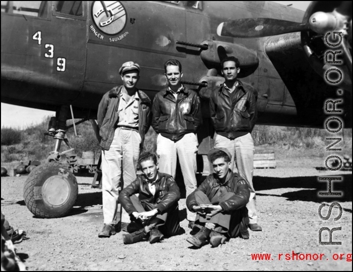 An air crew of the 491st Bomb Squadron pose in the revetment with B-25J #439, "Niagra's Belle", at Yangkai, China. Sitting are T/Sgt Henry P. Albro (radio) and S/Sgt Arquimidas L. Matos (gunner). Standing are (l-r) Lt. Seymour Mazer (navigator), Lt. Eric M. Hexburg (pilot) and S/Sgt Frank A. Koncolics (flight engineer).