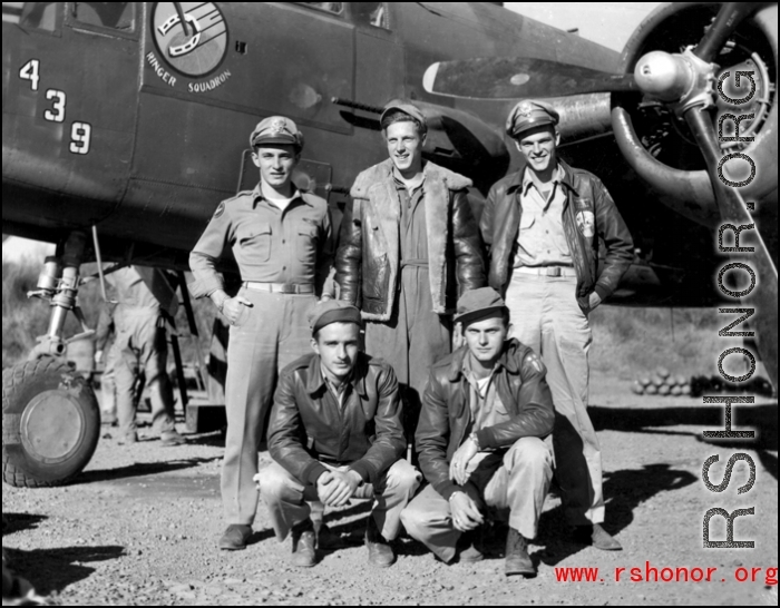 Aircrew of the 491st Bomb Squadron, in the revetment at Yangkai, China with B-25J #439. In front are (left-right) S/Sgt George K. Wilson (radio) and Pvt. Rowland G. Cox (gunner). Standing behind are (l-r) Capt. Alfred K. Patterson (pilot), S/Sgt Anthony E. Waskiewicz (engineer), Lt. Heinz H. Templin (pilot).