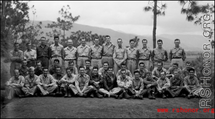Group photo of 491st Bomb Squadron maintenance and support personnel in early October 1944. This group had received notification they were being sent back to the USA after two years in the CBI theater. Photo was taken  on 'Red Dust Hill', the hostel area of Yangkai Air Base, Yunnan province.  Capt. William DeVries, Engineering Officer, is in the back row, sixth from the right. Other men await identification.  (Information from William Devries, deceased; provided by Tony Strotman)