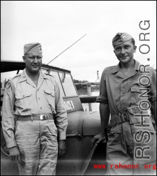 American officers stand in front of jeep in India during WWII.    From the collection of David Firman, 61st Air Service Group.