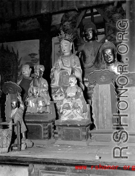 Figures inside a Buddhist temple in China.