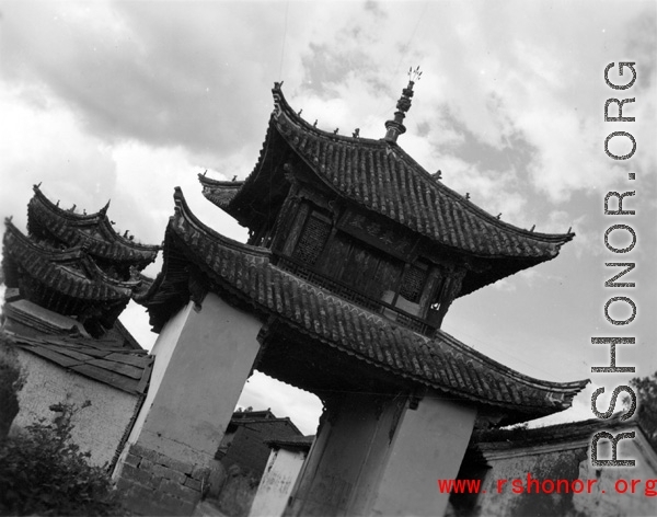 Ornate whitewashed gate at a village in Yunnan, probably Yangkai.  Architecture in Yunnan province, China.