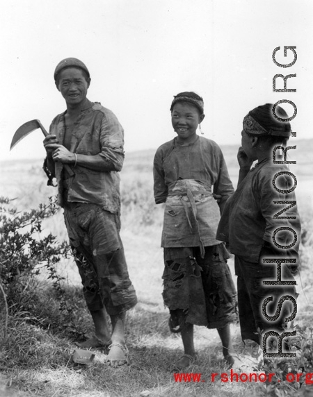 Local people in China: Villages work fields near Yangkai, Yunnan, China, during WWII.