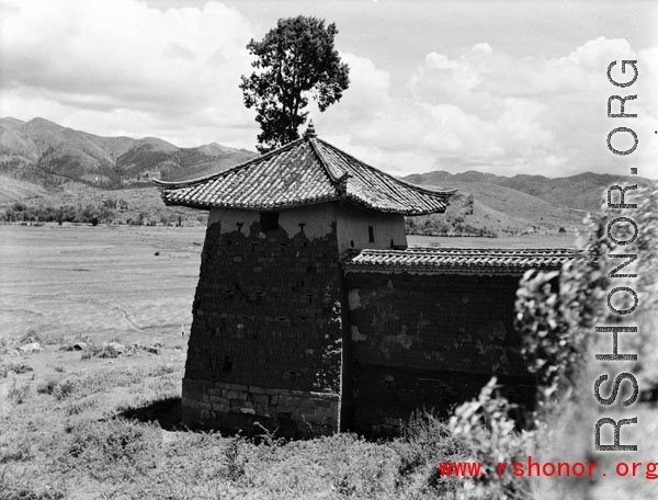 The corner of a walled compound in Yunnan province, China, during WWII.