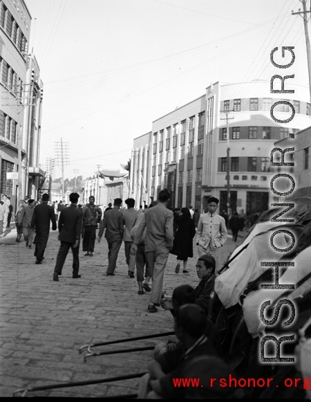 Street scene in Kunming city, Yunnan province, China, during WWII.