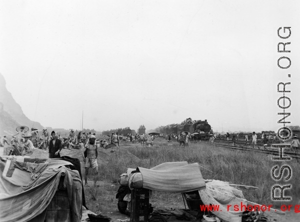 Chinese civilian evacuation in Guangxi province, China, during WWII, during the summer or fall of 1944 as the Japanese swept through as part of the large Ichigo push.