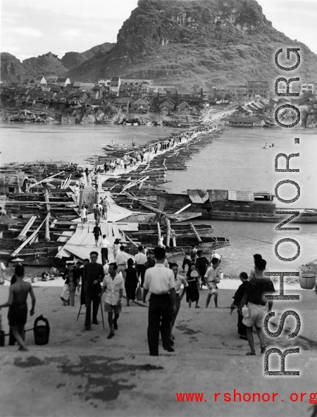 Looking over the river across the floating bridge towards Horse-saddle Mountain (马鞍山) in Liuzhou city, Guangxi province, during WWII.