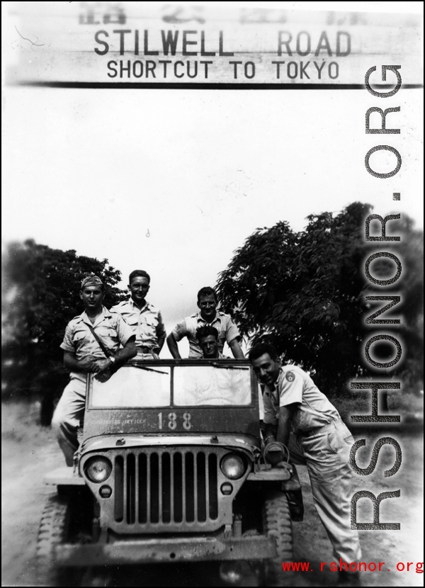 A jeep with American GIs in the CBI during WWII.  "The Stillwell Road, shortcut to Tokyo"