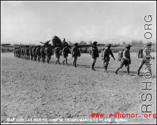 10 AF 10DEC44 G165-10 Chinese Troops march to plane in Burma during WWII. 