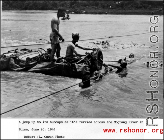 GIs float a jeep--wrapped in canvas to give it buoyancy--across the Moguang River in Burma, June 20, 1944.  Photo from Robert L. Cowan. An identical image was submitted by Raimon B. Cary.