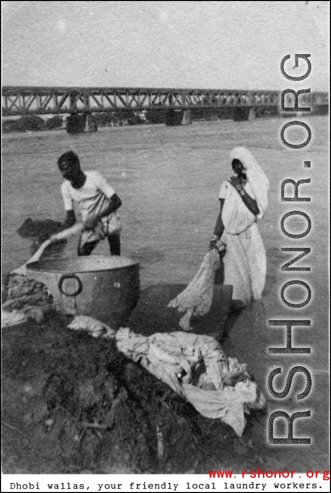 Dhobi wallas doing laundry in India during WWII.