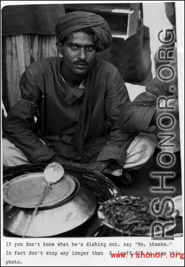 Food seller in India during WWII.  Photo from S. Louff.