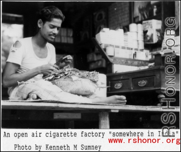 Indian man makes cigarettes by hand in India during WWII.  Photo from Kenneth M. Sumney.