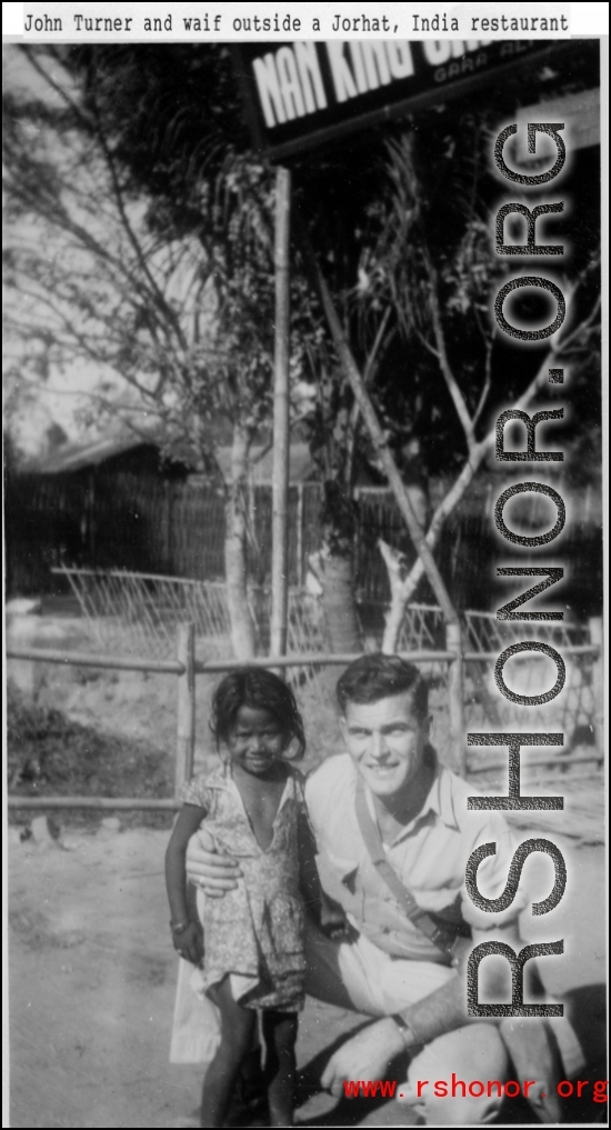 John Turner and waif outside of a Jorhat, India, restaurant, during WWII.