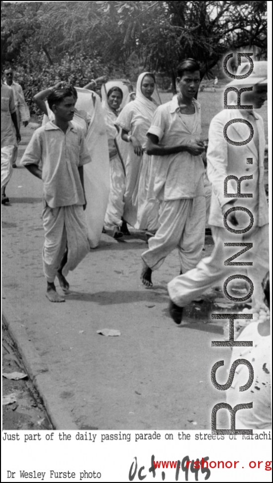 Local people walking the streets of Karachi during their daily lives, during WWII. In the CBI, Oct0ber 1945.   Photo from Dr. Wesley Furste.