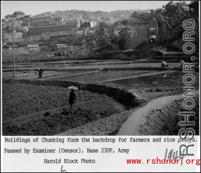 Buildings of Chongqing form the backdrop for farmers and rices paddies. 1944.  Photo from Harold L. Block.