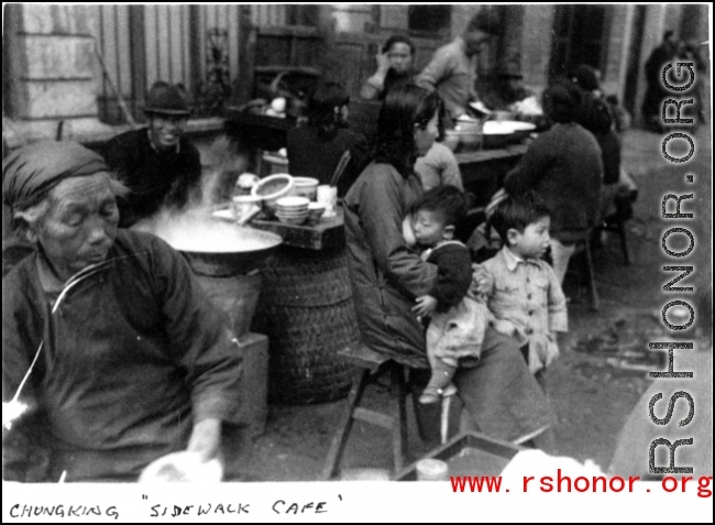 Sidewalk eatery in Chongqing during WWII. In the CBI.