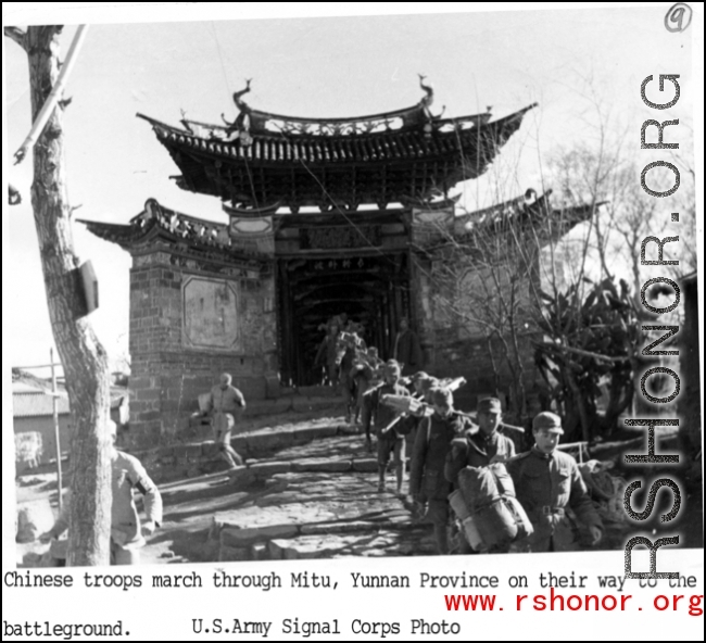 Chinese troops march through Mitu, Yunnan province, on their way to the battleground.  US Army Signal Corps photo.