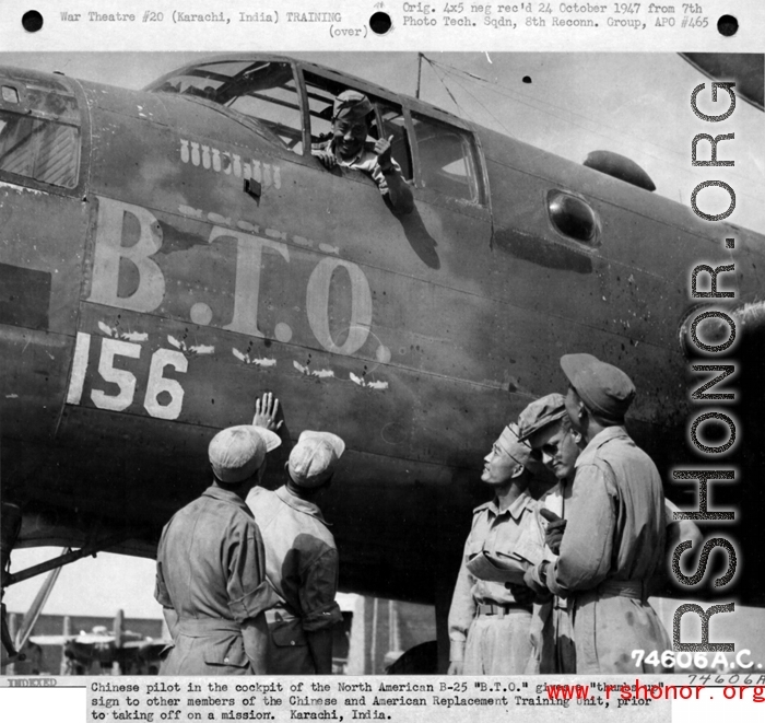 Chinese American Composite Wing (CACW) --Chinese pilot in the cockpit of the North American B-25 "B.T.O." give a "thumbs up" sign to other members of the Chinese and American Replacement Training Unit, prior to taking off on a mission. Karachi, India, during WWII.  Photo by 7th Photo Technician Squadron, 8th Reconnaissance Group.