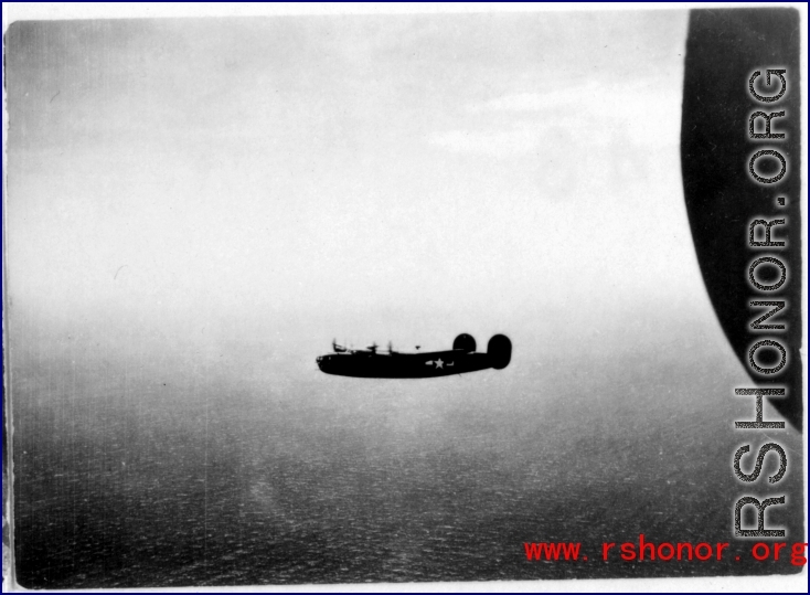 B-24 in flight during WWII in the CBI.  Photo provided by Emery and Beth Vrana.