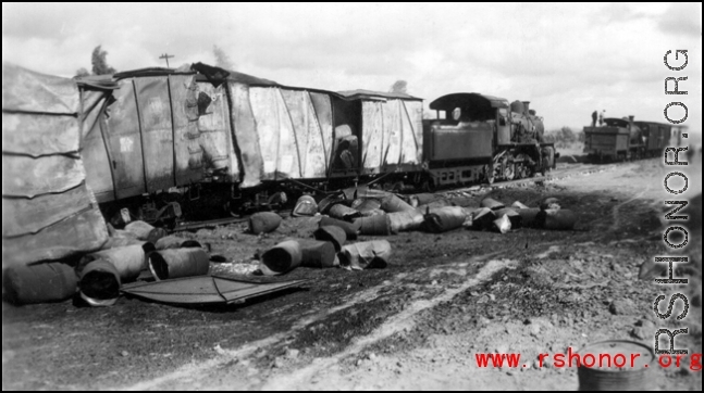 An American fuel train at the edge of the field, at Liuzhou, after bombing by Japanese bombers of September 27, 1944 during 45 minute air raid.