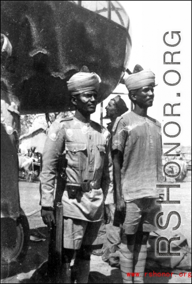 Indian soldiers guard B-25 bomber. Probably India, 1942 or 1943.  From the collection of Frank Bates.
