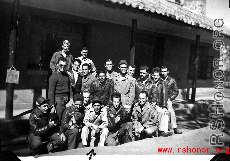 The men hanging out in Yangkai (Yangjie), Yunnan province, China. Walter S. Polchlopek is marked with an arrow.  Walter S. Polchlopek, Corporal, was lost on May 20, 1944, over the sea near the south east coast of China, after a B-24 mission to strike Japanese shipping.