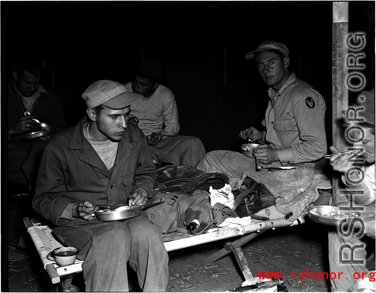 Here the men eat in their tent while on campout at Qingshuihai lake 清水海.