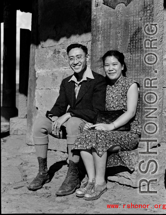 VIP Chinese couple pose at pavilion during a day outing in Songming county, during WWII.