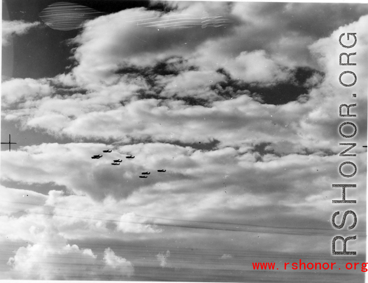 B-25 Mitchell bombers in flight in the CBI near an American air base, in the area of southern China, Indochina, or Burma. During WWII.