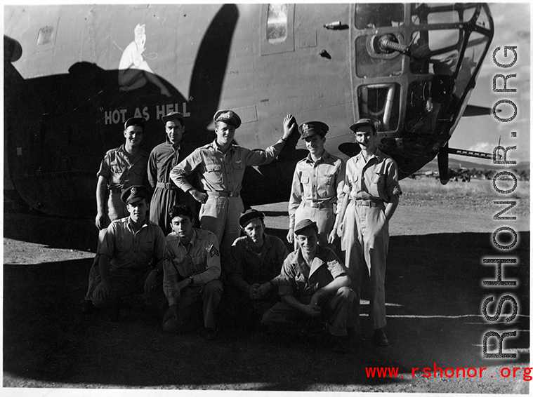 The B-24 bomber "HOT AS HELL" and crew in China during WWII.