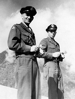 Flying into Battle to Pray His Men Home!  Pictured above in western Yunnan province, China, with Colonel William F. "Frank" Grubb, his war-time best friend, Chaplain Mengel went 'above-and-beyond the call of duty' by flying into battle with his men. Colonel Grubb recounted stories of how Chaplain Mengel rode in his co-pilot seat during bombing runs to pray until they returned safely to base. Chaplain Mengel did this unarmed, with only a knife for self-defense. See the image full size here.