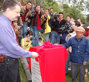 Figure 8: Unveiling the stone with Mr. Song, an eyewitness to Lt. Wallace's loss.