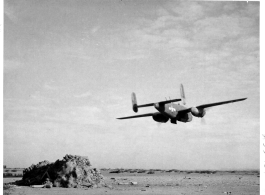 A B-25 of the CACW on a practice "skip bombing" run in India.