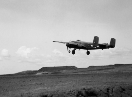 A B-25 takes off in the CBI, most likely from a base in Yunnan or Guangxi.