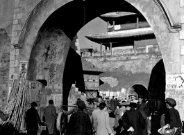 A busy town gate in Yunnan province, China, during WWII.  From the collection of Eugene T. Wozniak.