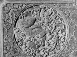 Carved wooden door or screen panel in Yunnan, China, during WWII.