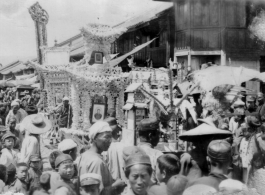 A funeral parade in a small town in China during WWII.