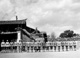 Chinese soldiers pose in a row. In Yunnan, China, during WWII.
