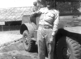 Captain Wilson Porch & monkey outside of the Officers Club Mess hall.  Shamshernagar Air Base India, June 1945.