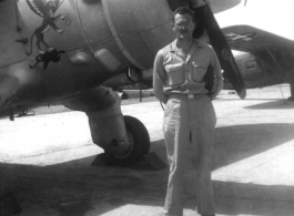 "Look at that Mustache."  Captain Wilson Porch aside plane (a C-64) marked with the Burmese mythical Chinthe.  Shamshernagar Air Base, India, June 1945.