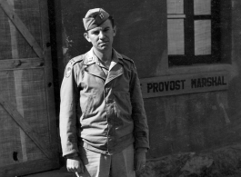 GI Posing before Base Provost Marshal Office in China, during WWII.