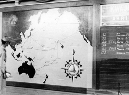 GI looks at flight route map at Kwajalein.  Lt. Mazer was initially released from active duty on January 12, 1947. However, he apparently was posted to Asia or had military trips to Asia between the end of the war and his release (or before April 1, 1948), visiting the Philippines, Okinawa, and various American-held islands on his route over the Pacific.