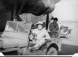 Radar men at Chenggong air base, Yunnan, China. During WWII.  Ira Underwood, Jack Leonard.  374th Bombardment Squadron B-24 "Massa's Dragon" #42-109862 in revetment at Chenggong.