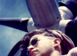 Stanley Mamlock posing before propeller of a P-51 in the CBI.  During WWII.
