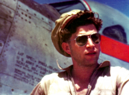 Stanley Mamlock posing before P-51 in the CBI.  During WWII.
