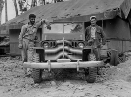 GIs of the 797th Engineer Forestry Company in Burma, pose with a jeep that has had chrome grill and bumper added on.  During WWII.