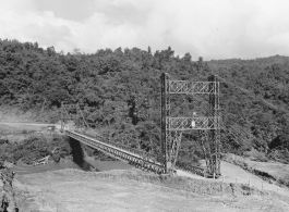 797th Engineer Forestry Company in Burma: Suspension bridge over a river on the Burma Road.  During WWII.